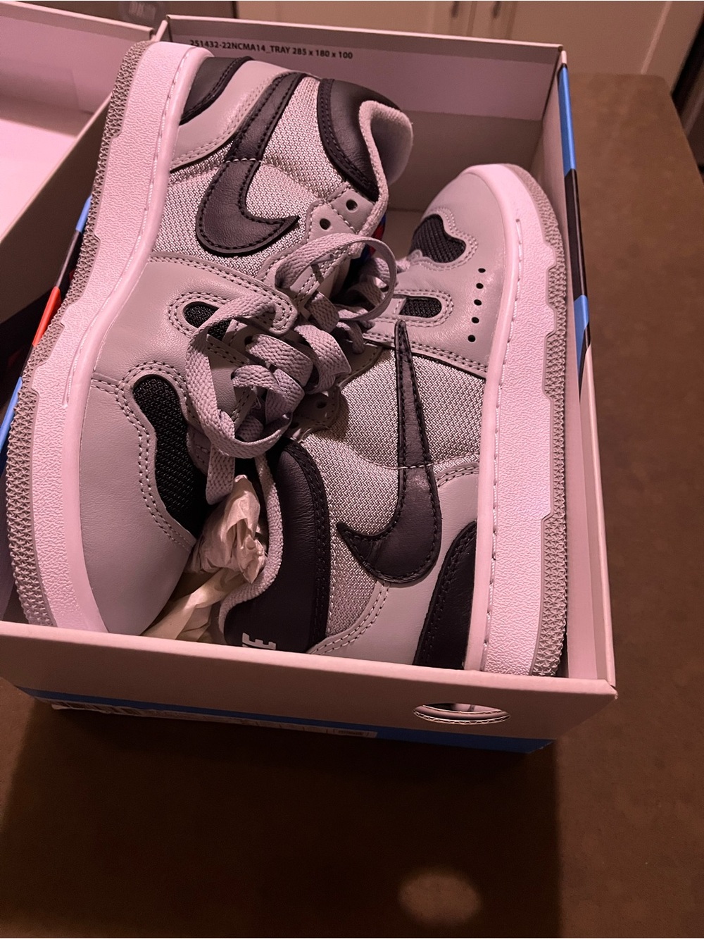 Nike Kids Gray and Black Low-Top Travis Scott 5 kids or 6.5 women. New in box.
